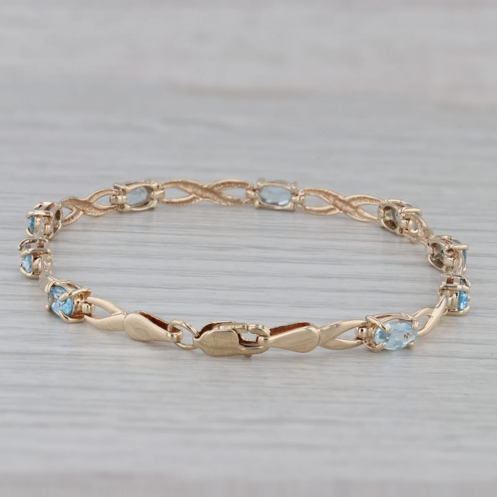 Gray 2.60ctw Blue Topaz Tennis Bracelet 10k Yellow Gold 7" 3.5mm