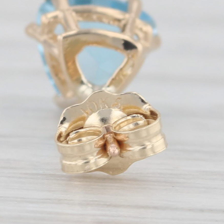 Light Gray 2ctw Blue Topaz Stud Earrings 10k Yellow Gold Trillion Solitaires
