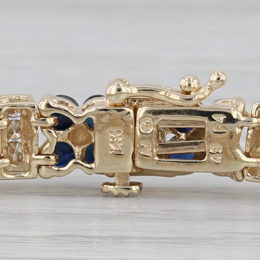 Gray 5.49ctw Blue Sapphire Flower Diamond Tennis Bracelet 14k Yellow Gold 6.75"