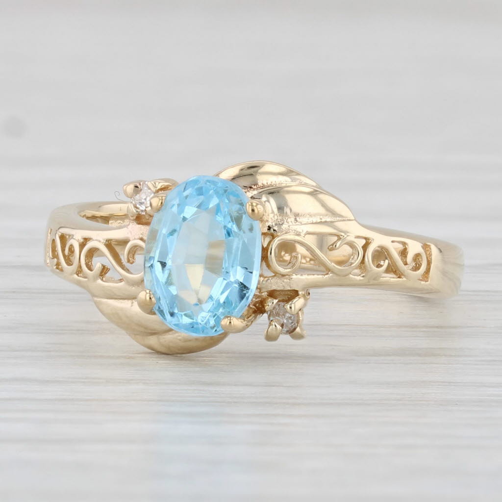 Light Gray 1.02ctw Oval Blue Topaz Diamond Ring 10k Yellow Gold Size 6.25