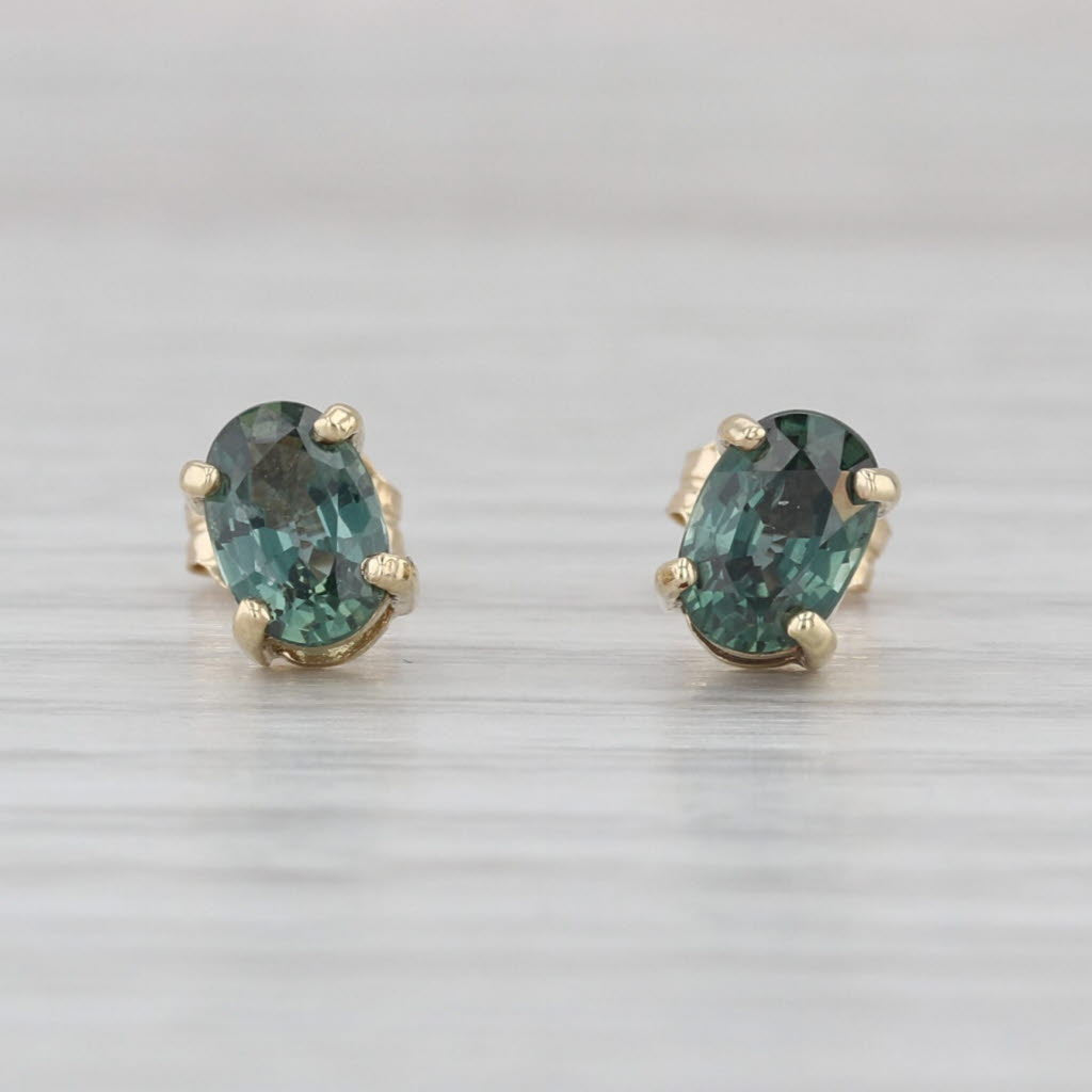 1.30ctw Color Change Sapphire Stud Earrings 10k Yellow Gold Oval Solitaire Studs