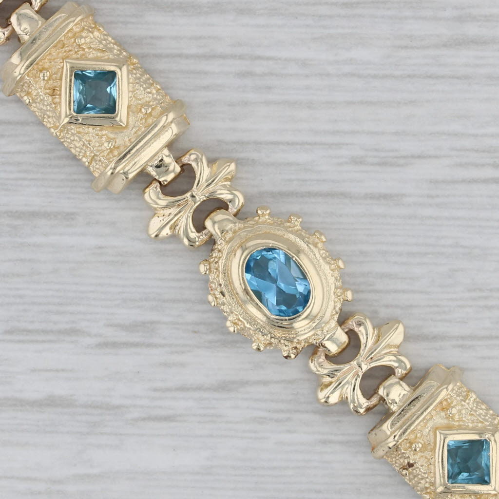 Gray 3ctw Blue Topaz Ornate Bracelet 14k Yellow Gold 7.25" 10.4mm