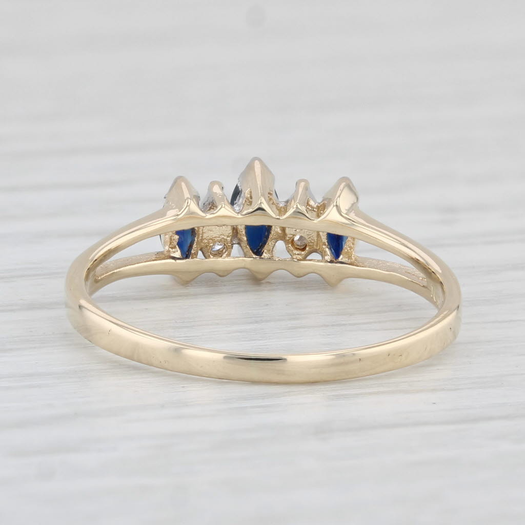 Light Gray 0.37ctw Marquise Blue Sapphire Diamond Ring 10k Yellow Gold Diamond Accents