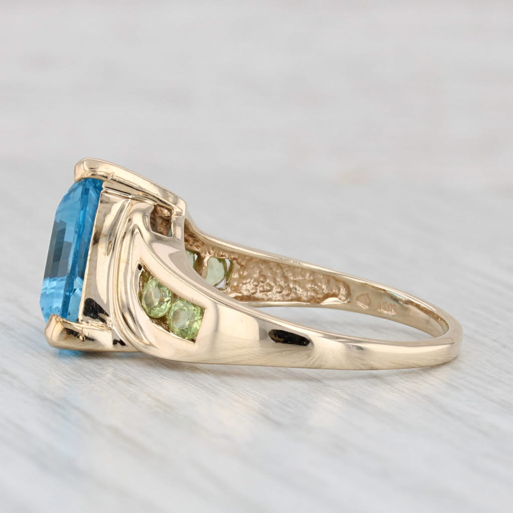 Light Gray 7.54ctw Trillion Blue Topaz Green Peridot Ring 10k Yellow Gold Size 9