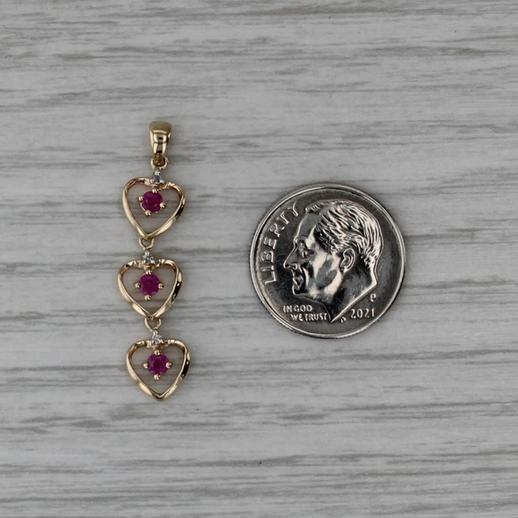 0.24ctw 3-Stone Ruby Hearts Pendant 14k Yellow Gold Journey Drop
