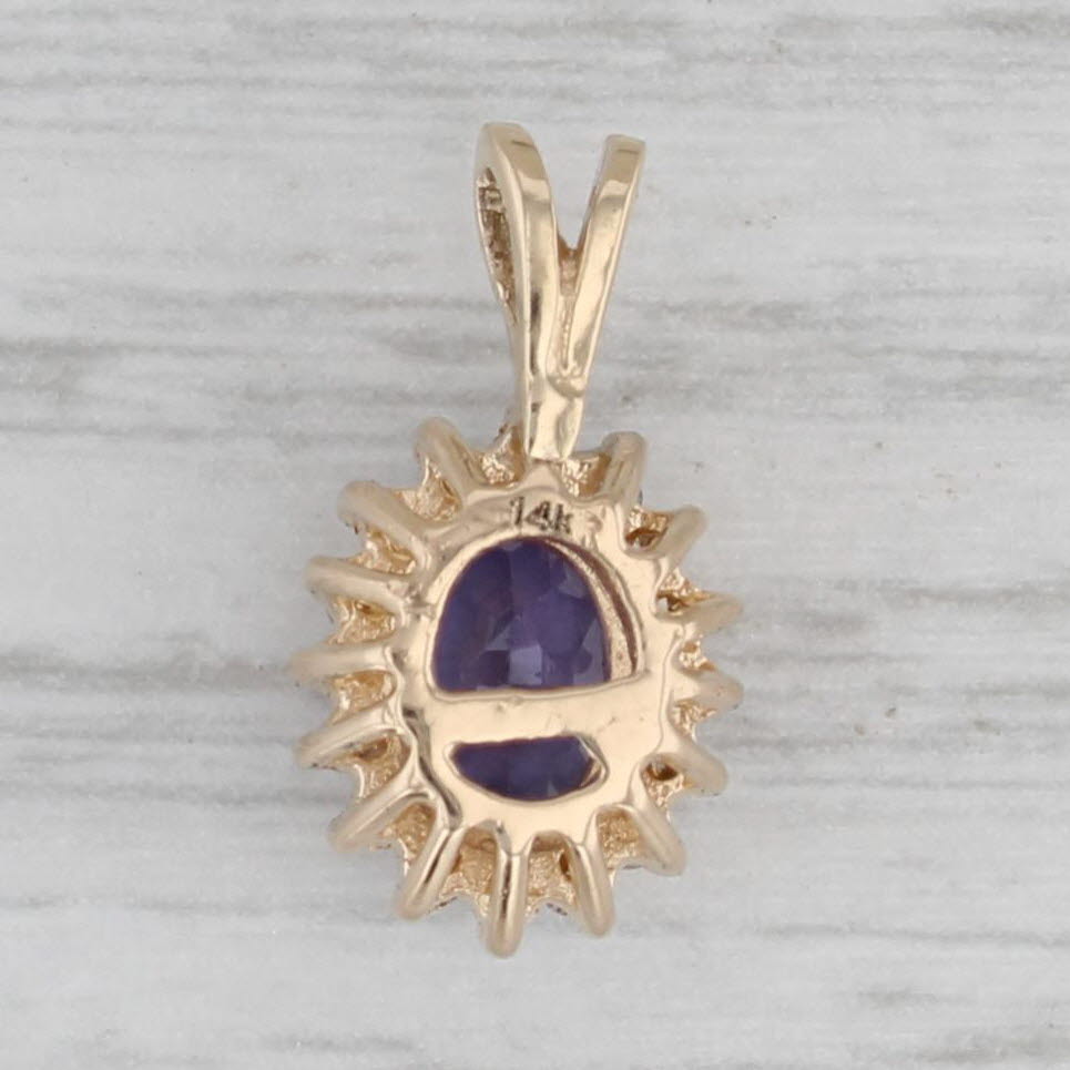 Gray 0.96ctw Oval Tanzanite Diamond Halo 14k Yellow Gold Pendant