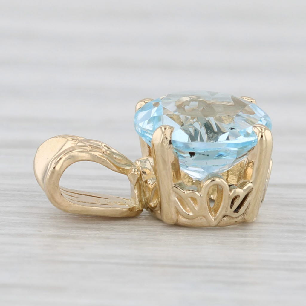 Light Gray 2.30ctw Round Solitaire Blue Topaz Pendant 14k Yellow Gold