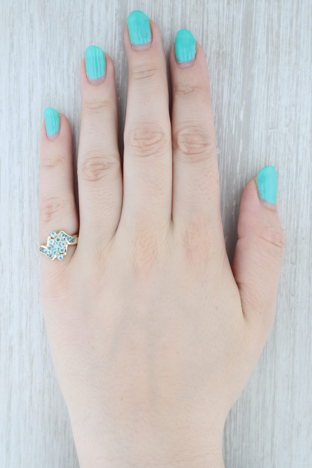Light Gray 1.15ctw Blue Apatite Cluster Bypass Ring 10k Yellow Gold Size 7