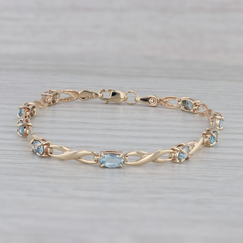 Gray 2.60ctw Blue Topaz Tennis Bracelet 10k Yellow Gold 7" 3.5mm