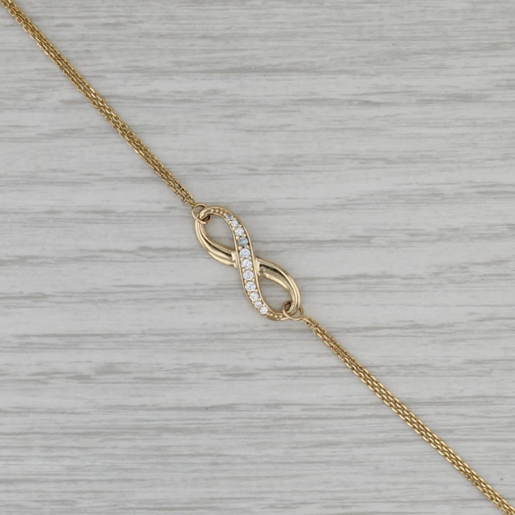 Cubic Zirconia Infinity Knot Bracelet 10k Yellow Gold 7-7.5" Cable Chain