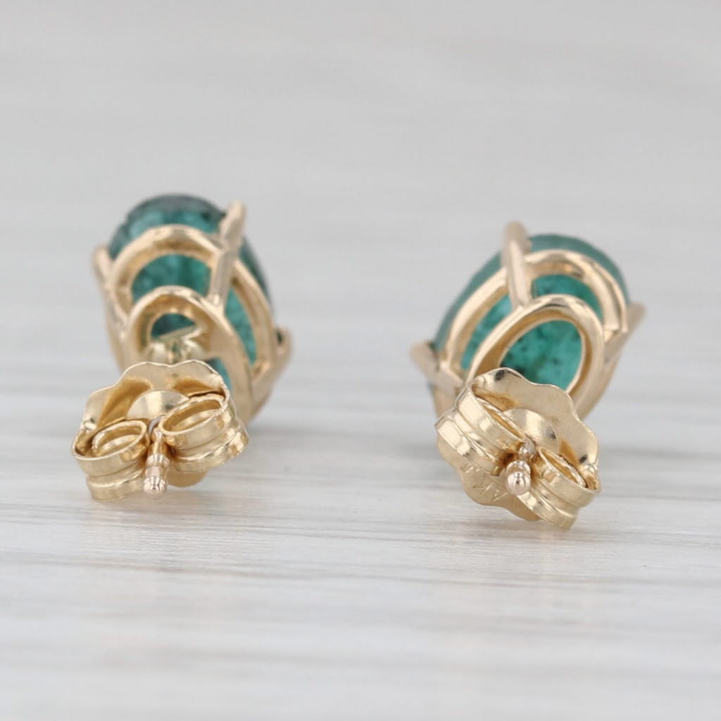 Light Gray 1.40ctw Oval Emerald Solitaire Stud Earrings 14k Yellow Gold