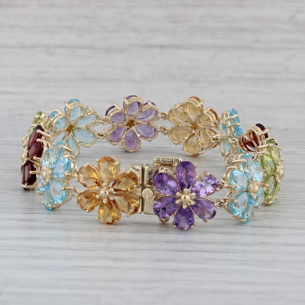 Gray 43.8ctw Gemstone Flower Bracelet 10k Gold 7" Garnet Topaz Peridot Amethyst