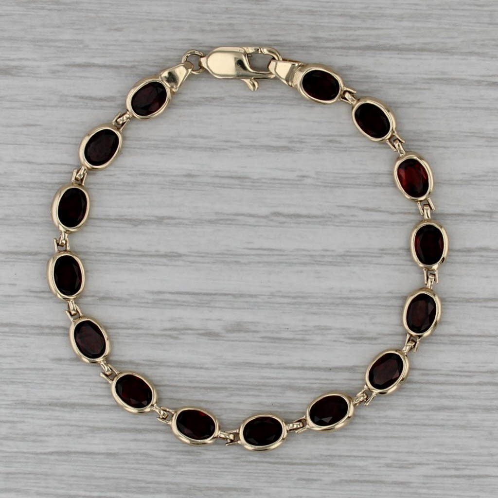 13ctw Garnet Tennis Bracelet 10k Yellow Gold 7" 6.3mm Oval Links
