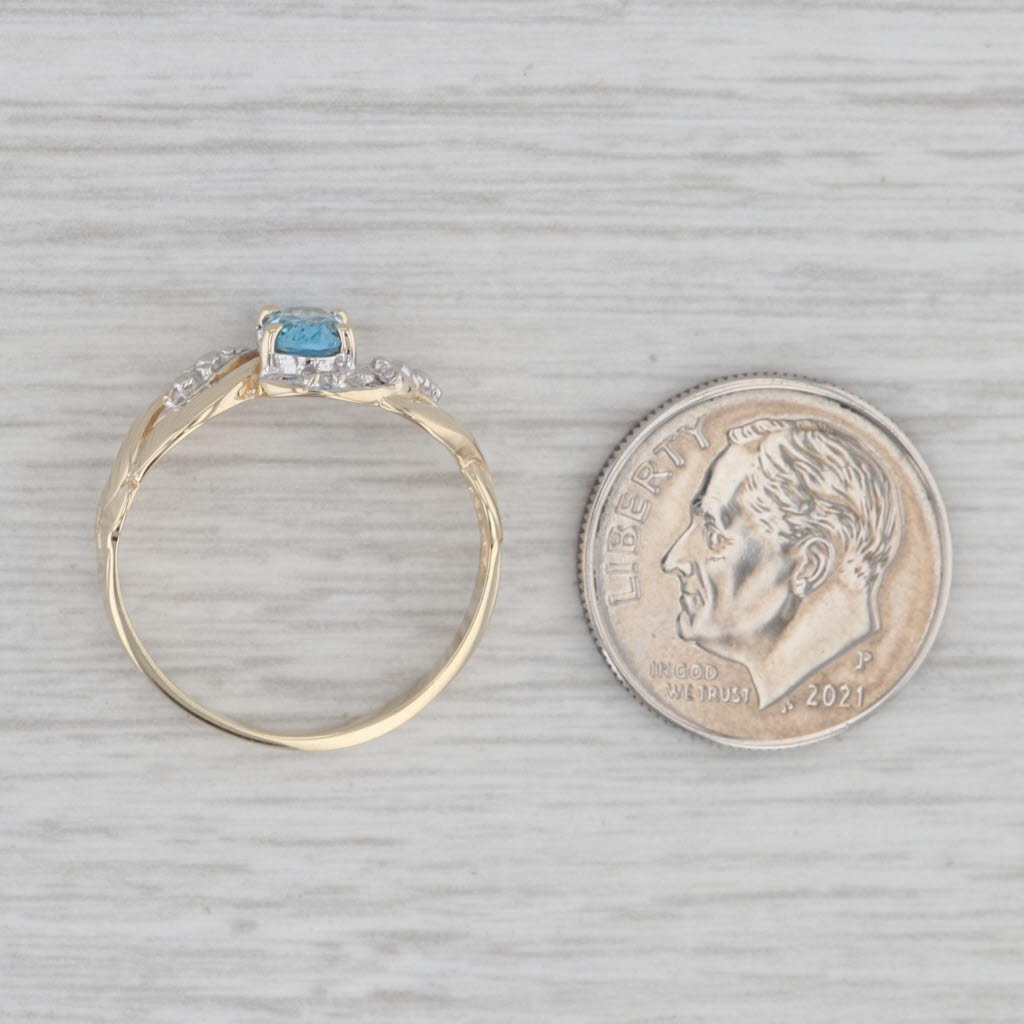 Gray 0.40ct Oval Blue Topaz Ring 10k Yellow Gold Diamond Accents Size 6.5