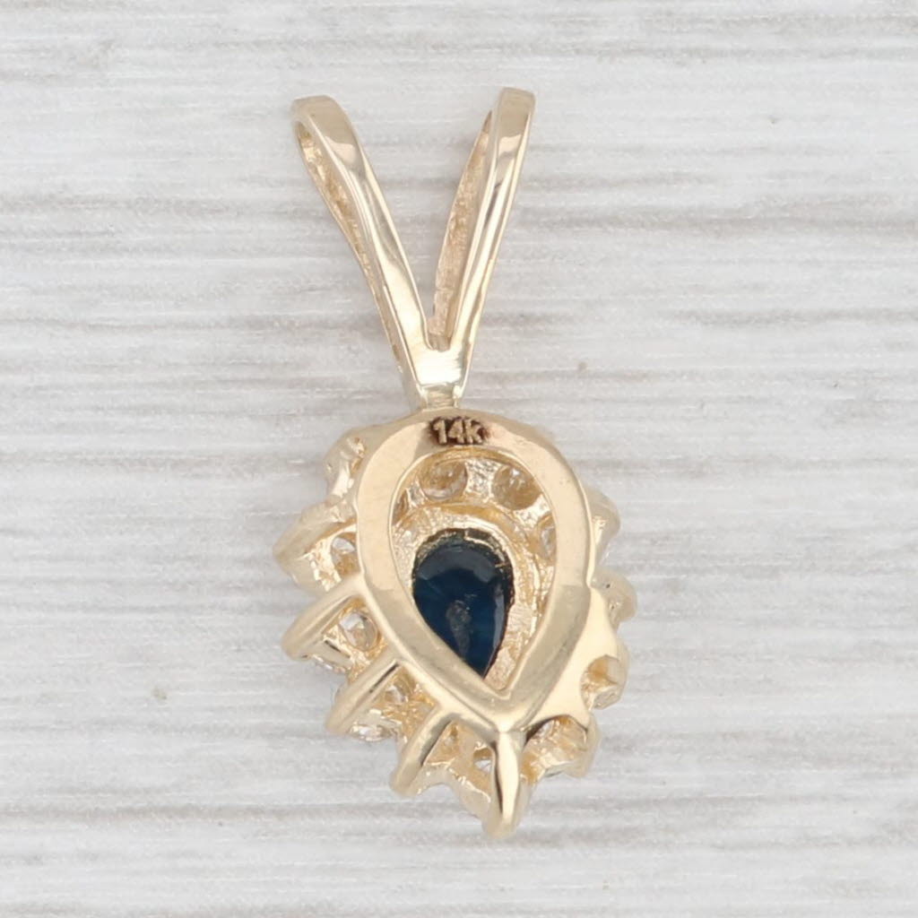 Light Gray 0.85ctw Pear Blue Sapphire Diamond Halo Pendant 14k Yellow Gold