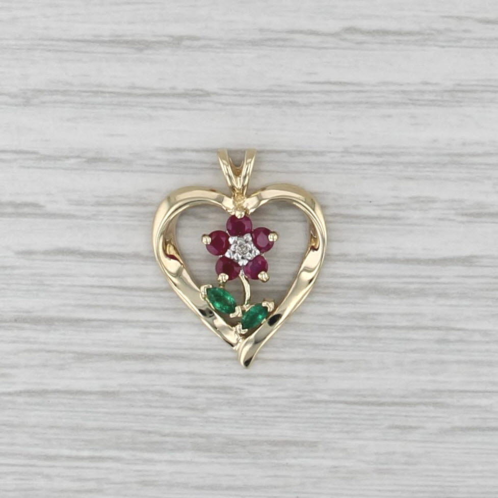 0.53ctw Ruby Emerald Flower Heart Pendant 10k Yellow Gold Diamond Accents