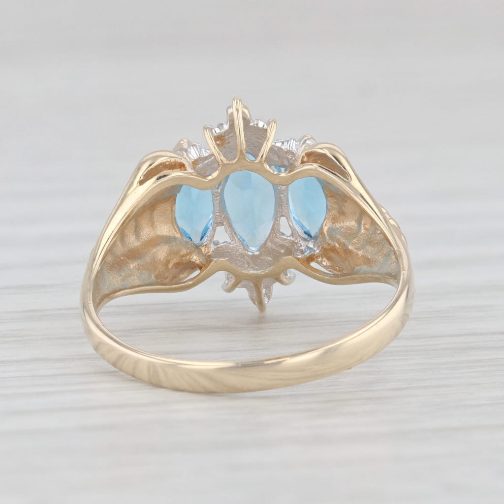 Light Gray 1.25ctw 3-Stone Blue Topaz Diamond Ring 10k Yellow Gold Size 7.25