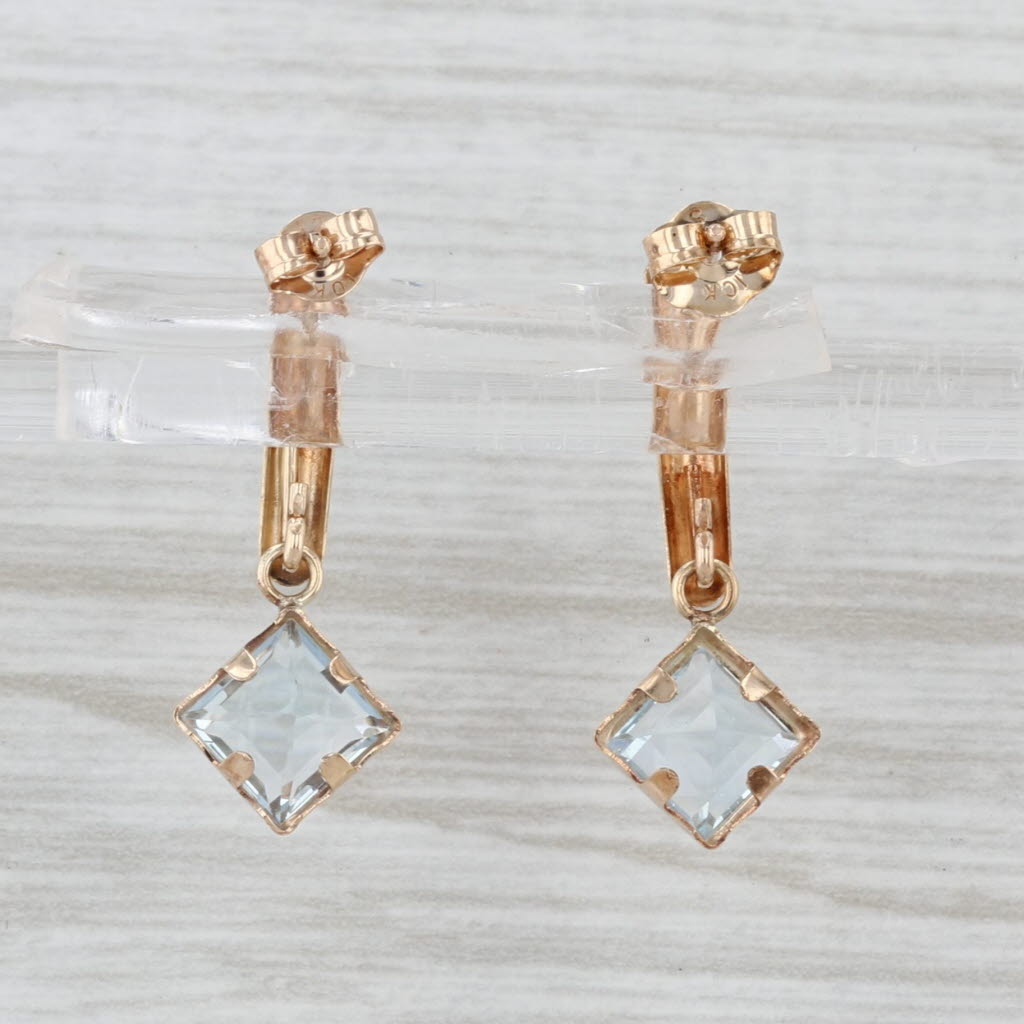 1.14ctw Blue Topaz Dangle Earrings 10k Yellow Gold Pierced Drops