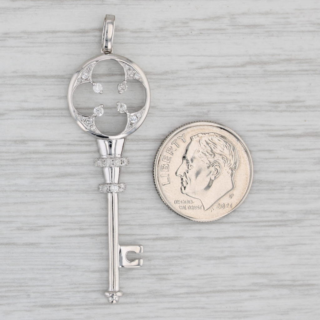 Gray 0.25ctw Diamond Accented Skeleton Key Pendant 10k White Gold Charm