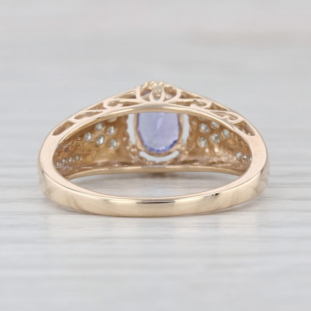 0.87ctw Oval Tanzanite Diamond Ring 10k Yellow Gold Size 8.25