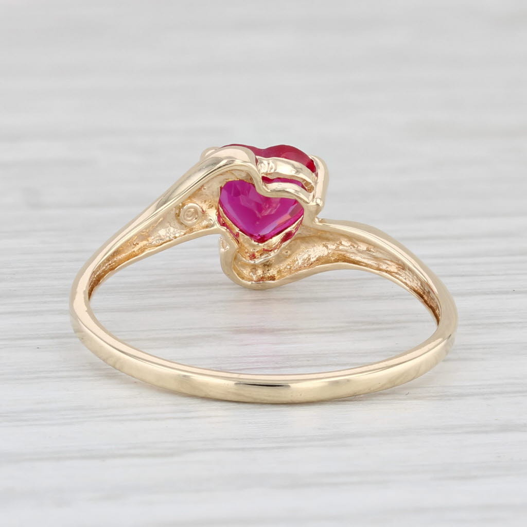 Light Gray 0.70ct Lab Created Ruby Heart Ring 10k Yellow Gold Bypass Size 8