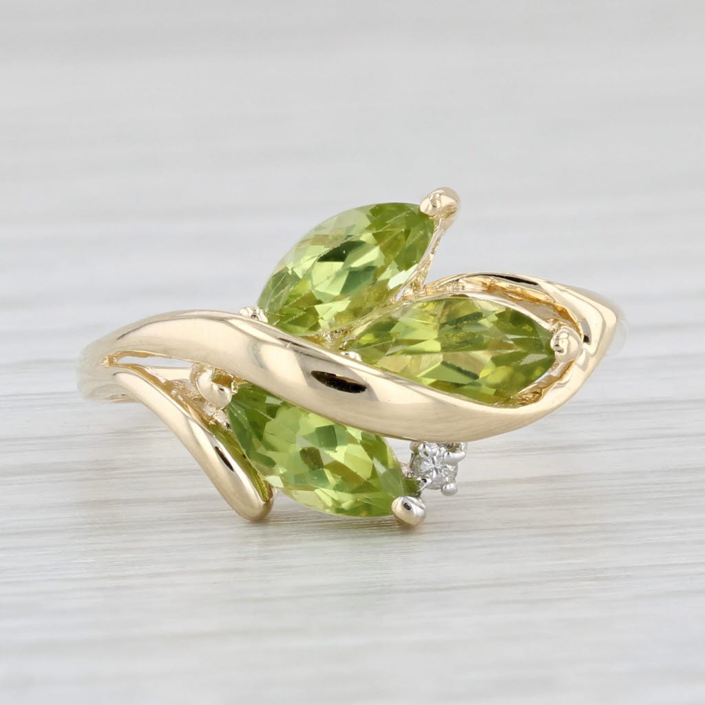 Light Gray 1.96ctw Peridot 3-Stone Ring 14k Yellow Gold Size 7.75 Diamond Accent