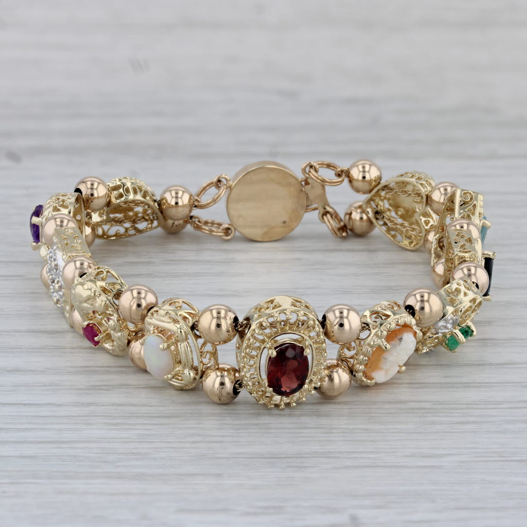 Gray Gemstones Slide Charm Bracelet 10k Gold 7.25" Cameo Amethyst Emerald Topaz Opal