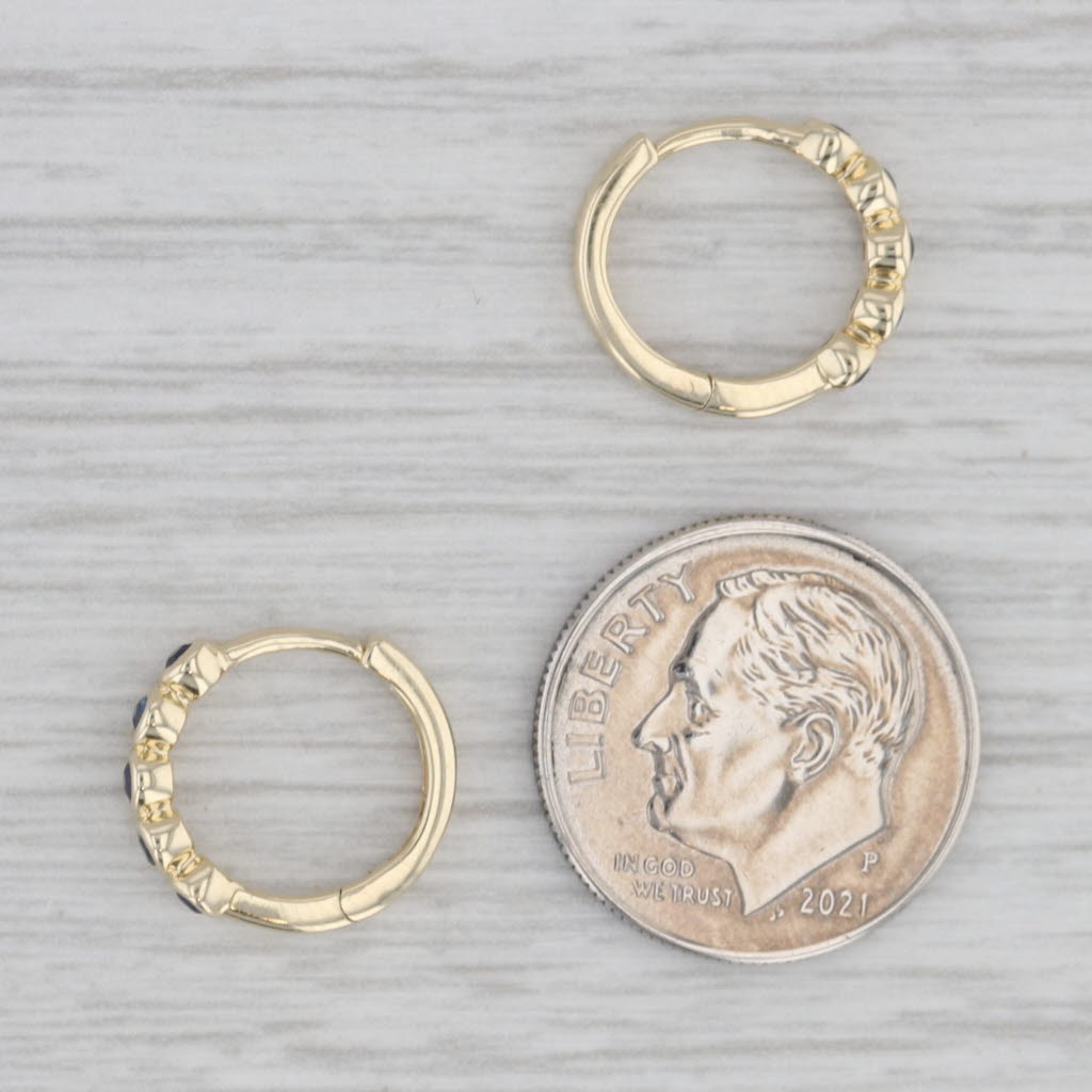 Gray New Blue 0.10ctw Sapphire Hoop Huggie Earrings 10k Yellow Gold Round Hoops