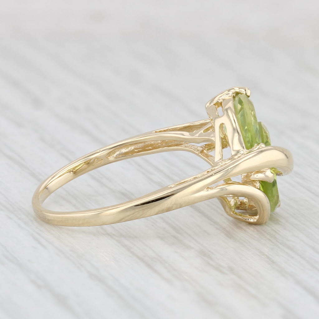 Light Gray 1.96ctw Peridot 3-Stone Ring 14k Yellow Gold Size 7.75 Diamond Accent