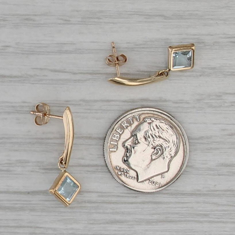 1.14ctw Blue Topaz Dangle Earrings 10k Yellow Gold Pierced Drops