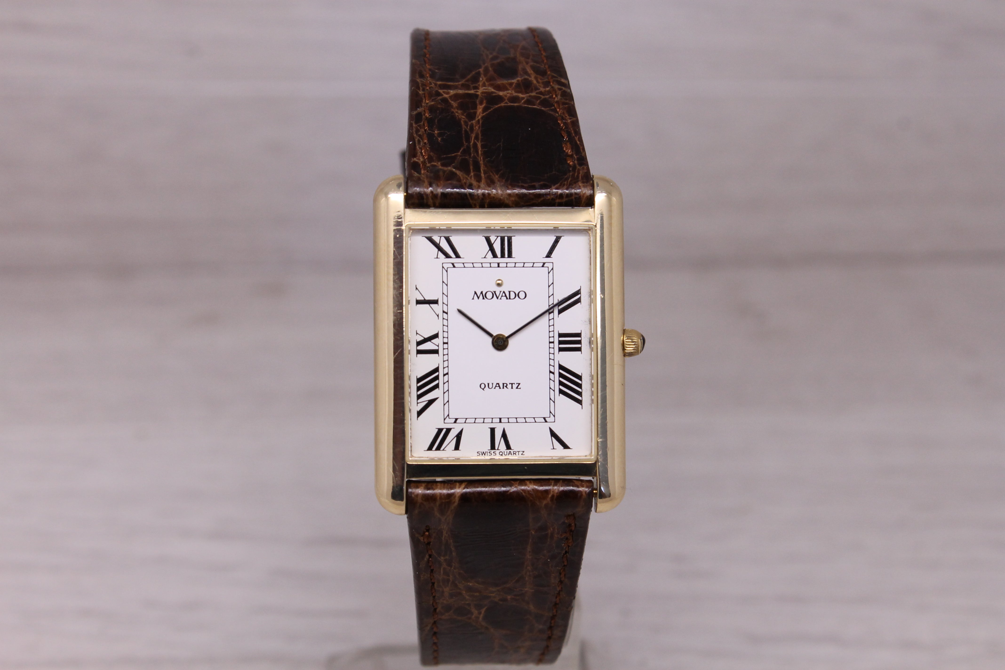Vintage c.1990 Movado 14k Yellow Gold 25mm Tank Dress Watch Quartz Roman Dial