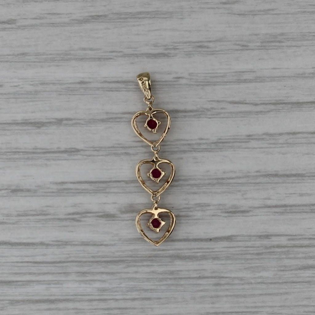 0.24ctw 3-Stone Ruby Hearts Pendant 14k Yellow Gold Journey Drop