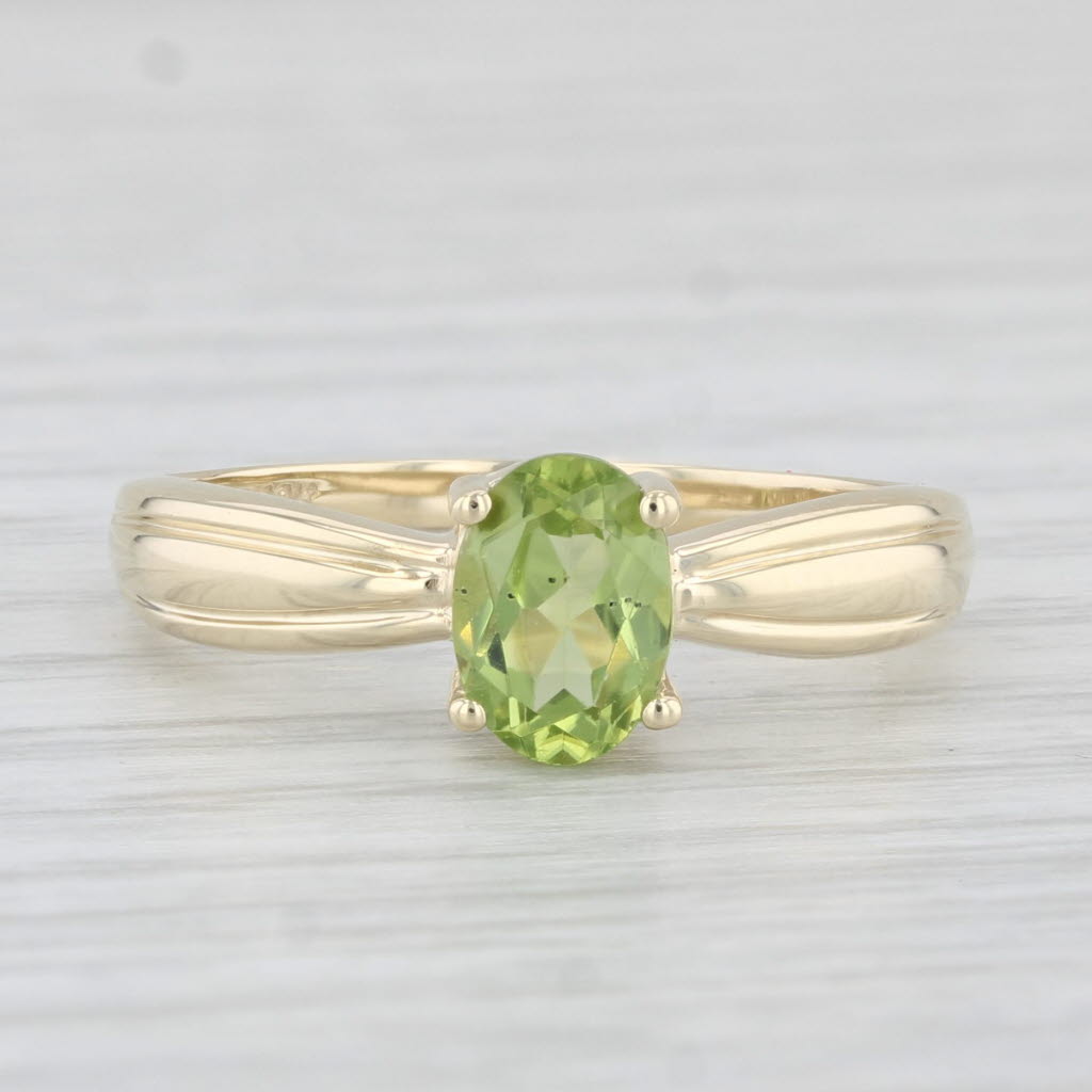 Light Gray 0.80ct Oval Peridot Solitaire Ring 10k Yellow Gold Size 7.25