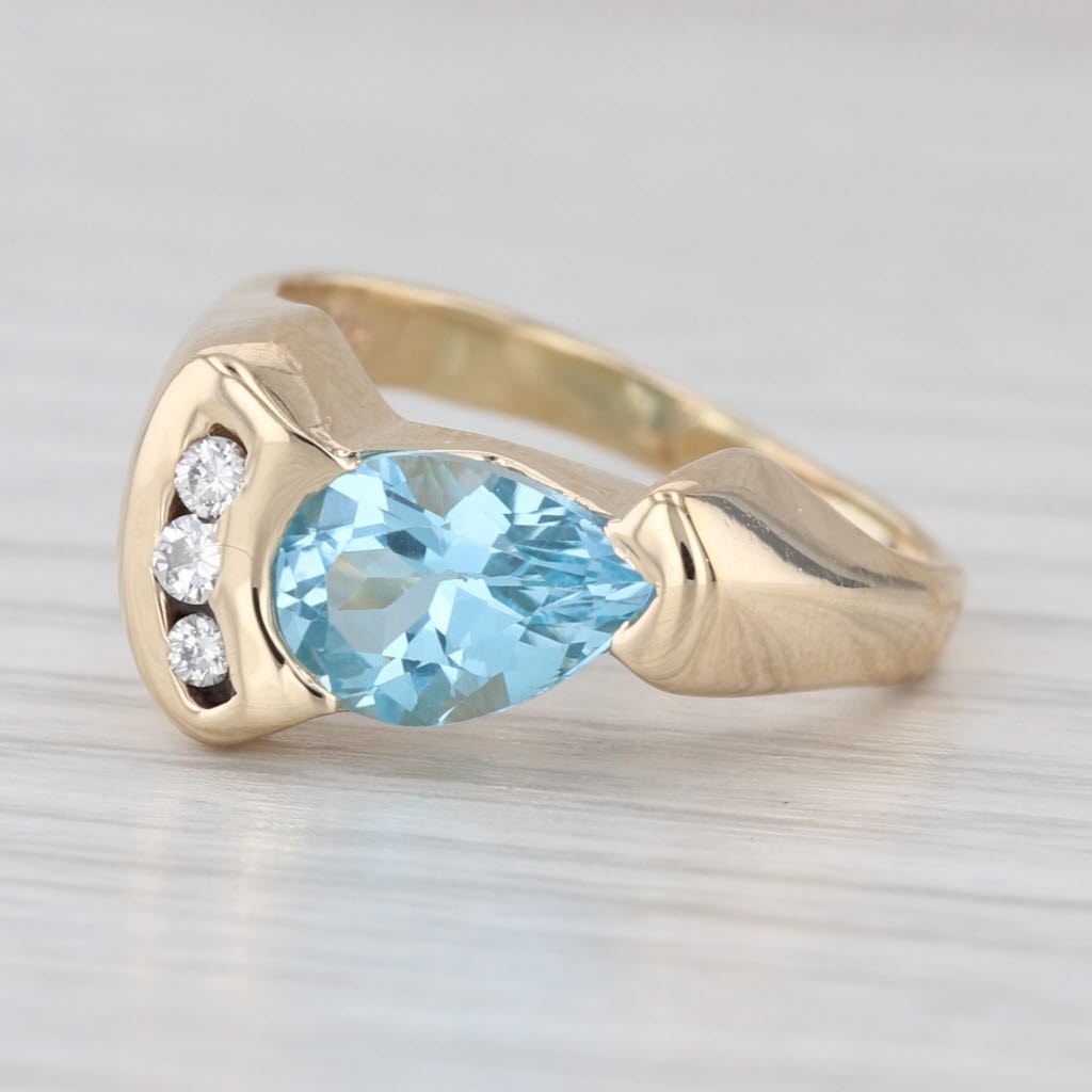 1.70ctw Pear Blue Topaz Diamond Ring 14k Yellow Gold Size 5.25