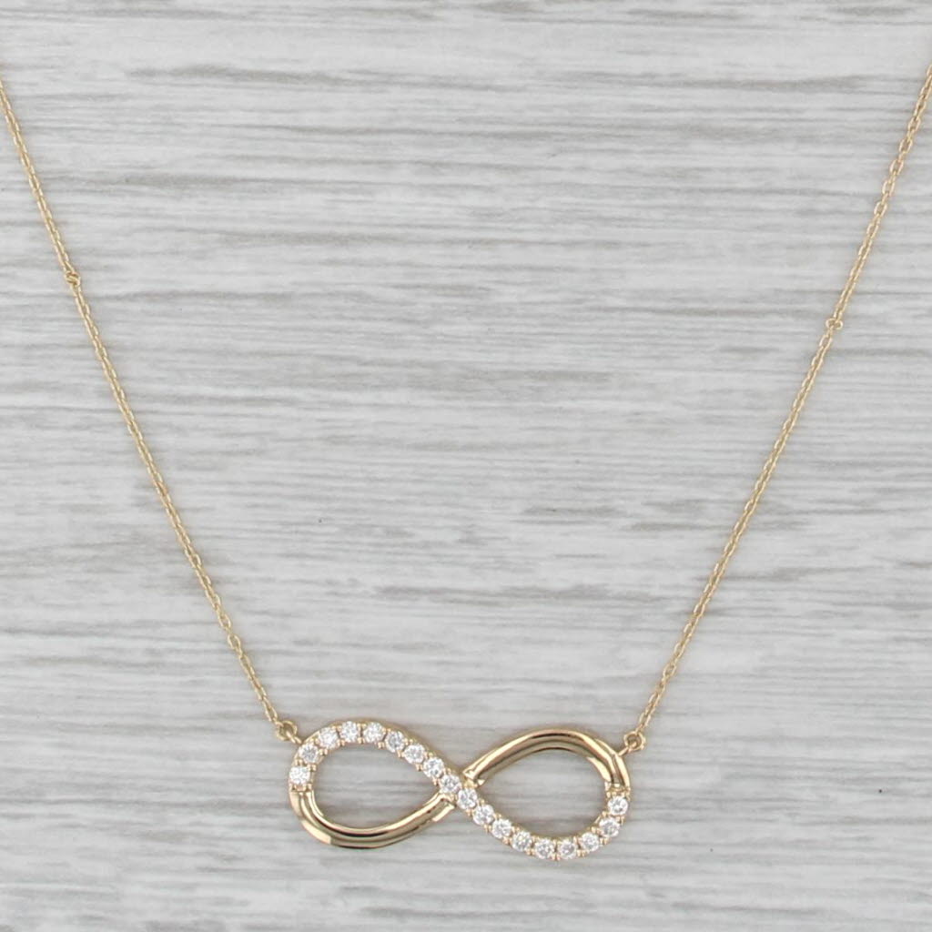 0.16ctw Diamond Infinity Knot Pendant Necklace 18k Yellow Gold 16.25-17.75"