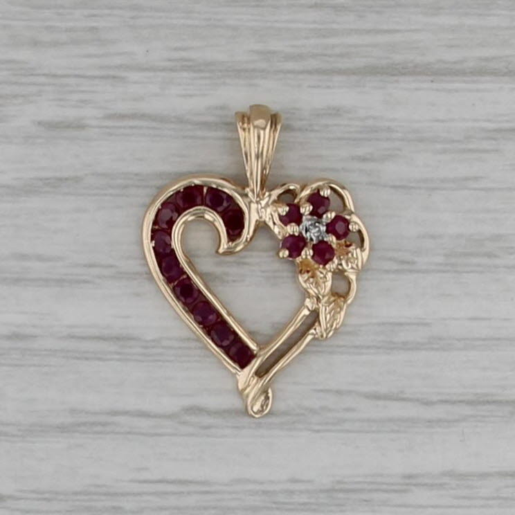 0.55ctw Ruby Flower Heart Pendant 10k Yellow Gold Diamond