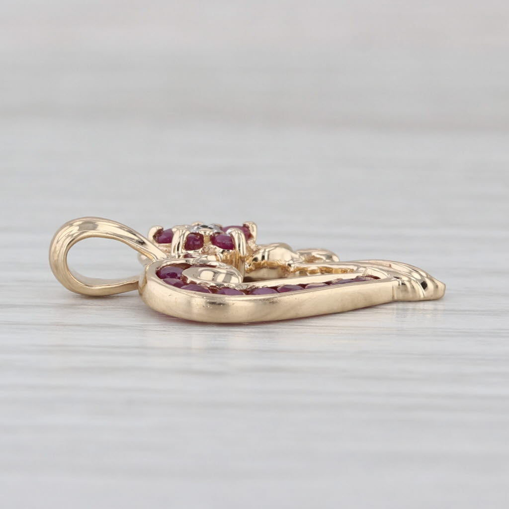 0.55ctw Ruby Flower Heart Pendant 10k Yellow Gold Diamond