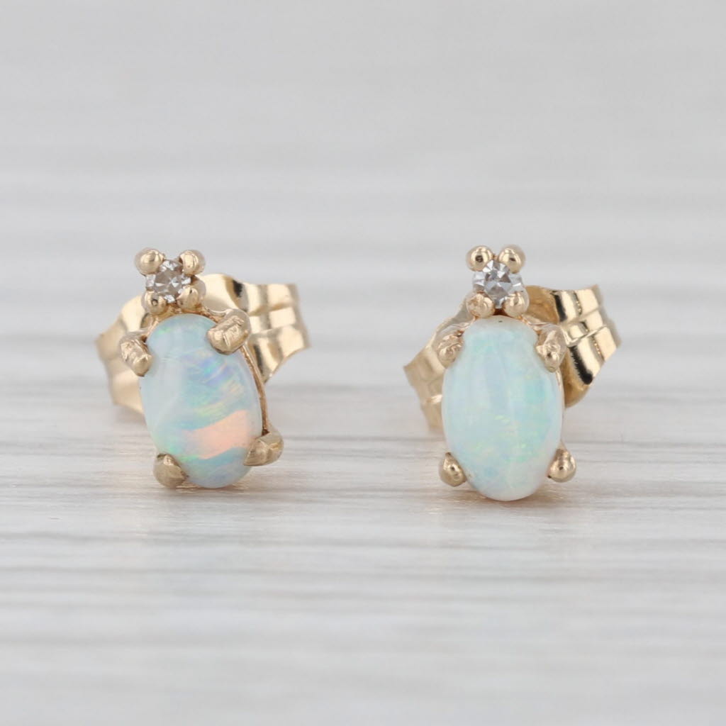 Oval Cabochon Opal Stud Earrings 10k Yellow Gold Diamond Accents