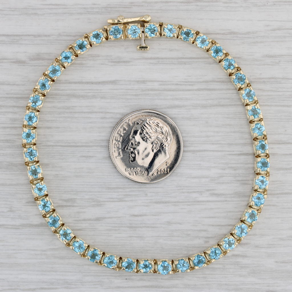 Gray 5.70ctw Blue Topaz Tennis Bracelet 14k Yellow Gold 7" 3.6mm