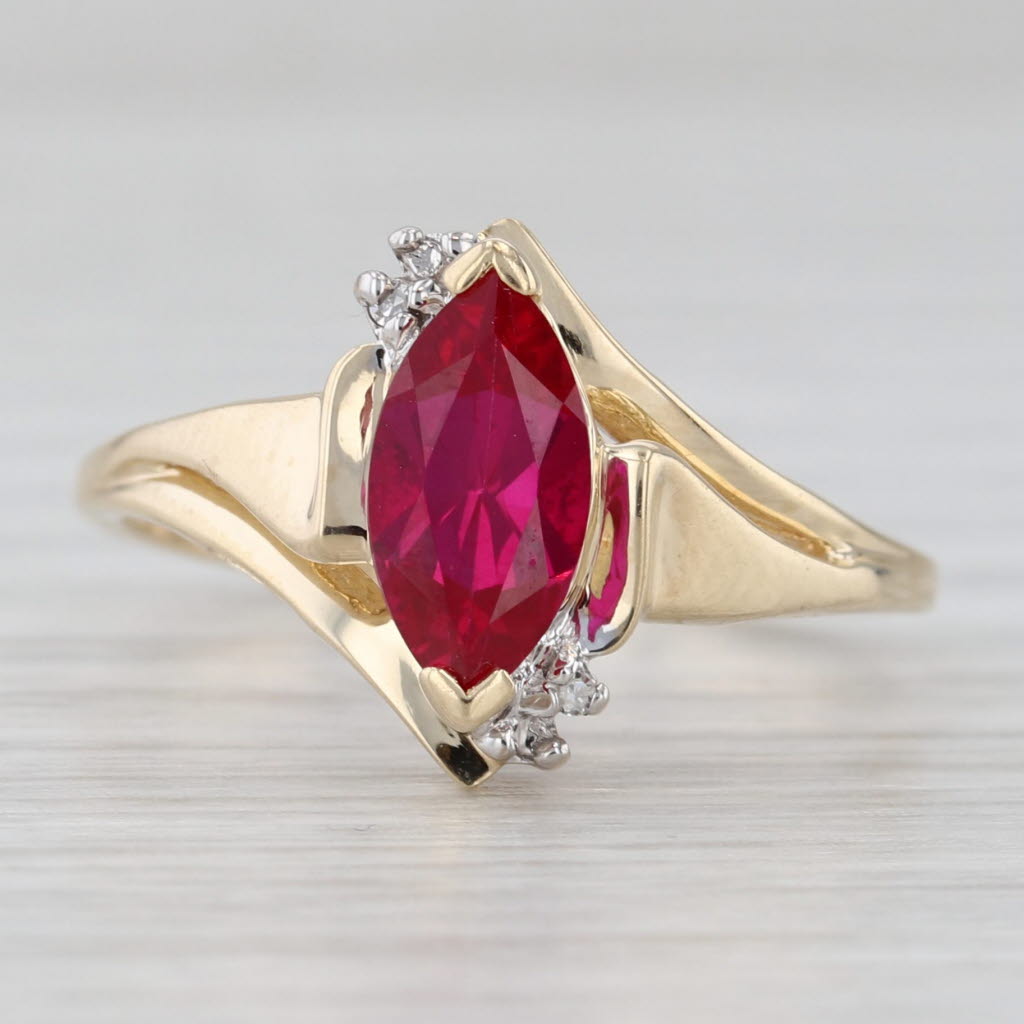 Light Gray 1.48ct Lab Created Ruby Ring 10k Yellow Gold Size 8.25 Bypass