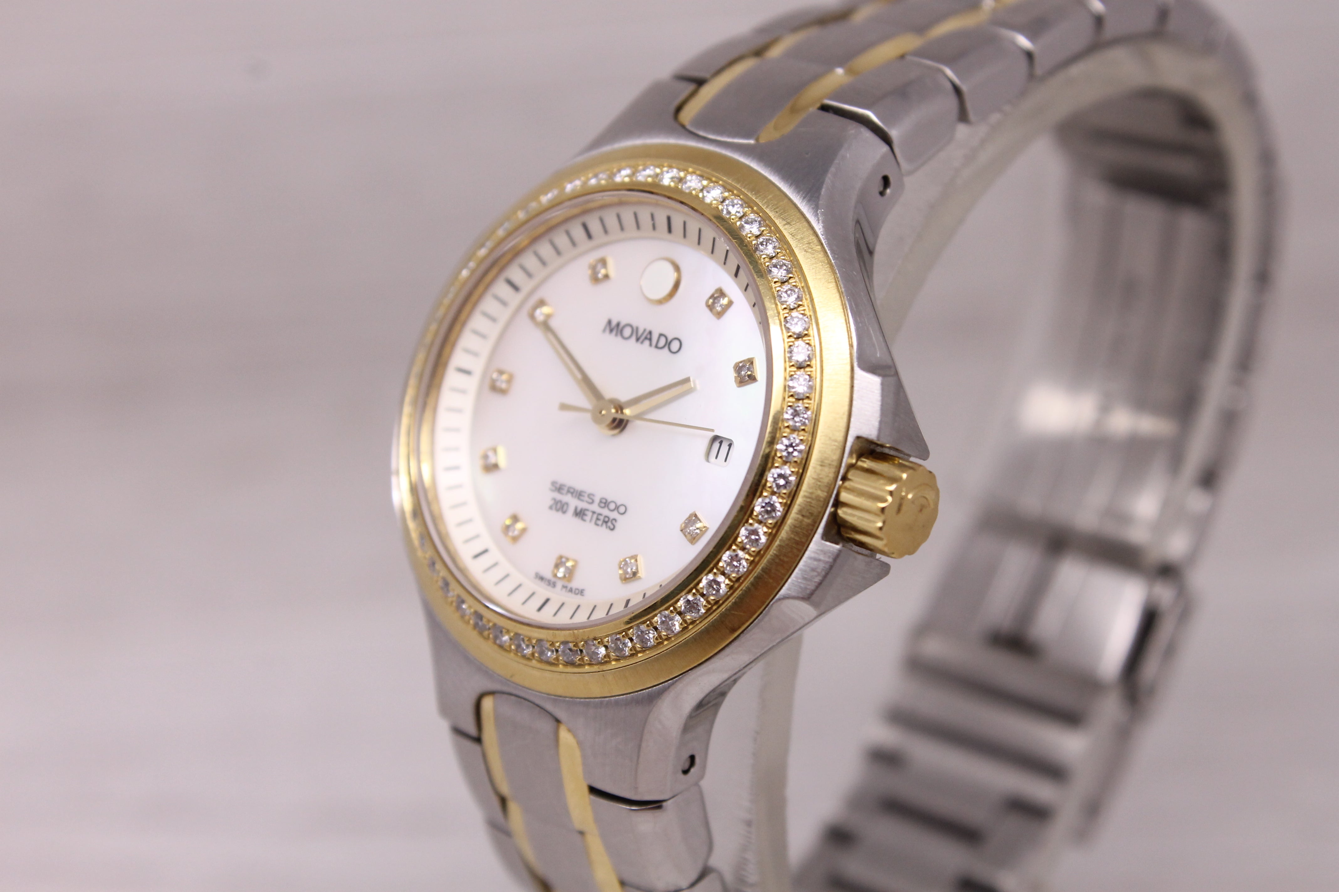 Movado Ladies Series 800 Diamond Bezel MOP 30mm Watch Two-Tone Steel Quartz Date