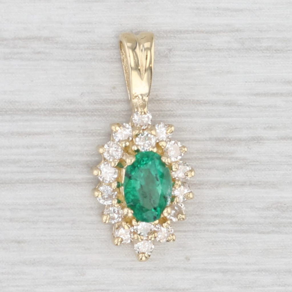 Light Gray 0.65ctw Emerald Diamond Halo Pendant 14k Yellow Gold