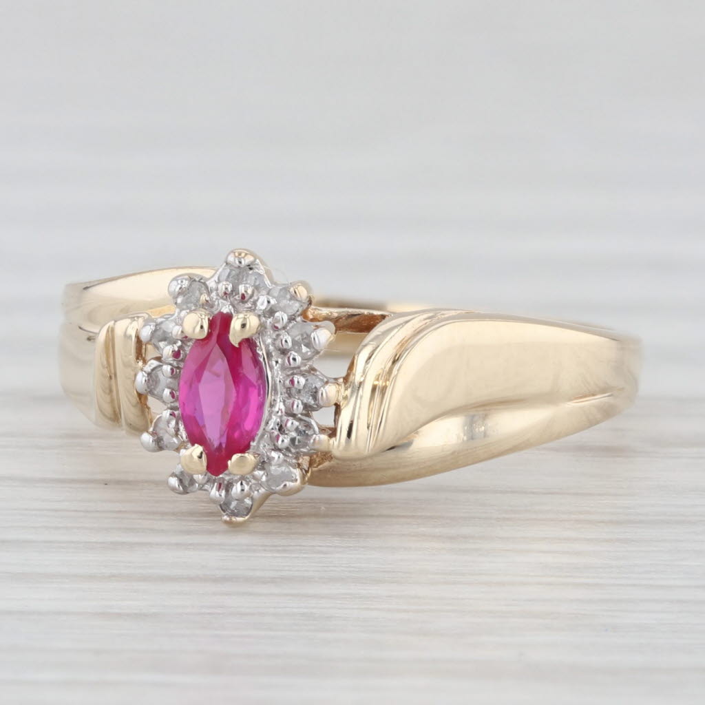 Light Gray 0.25ctw Marquise Ruby Diamond Halo Ring 10k Yellow Gold Size 6.25