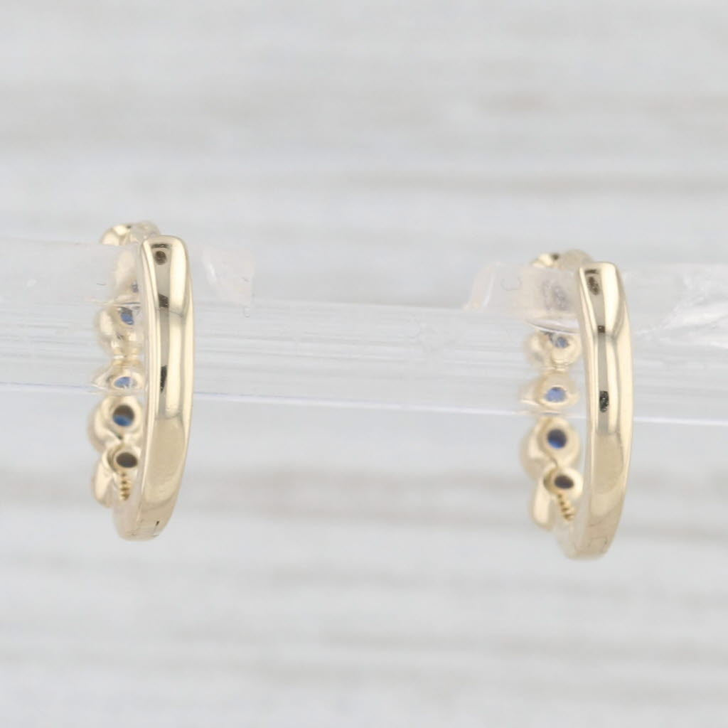 Light Gray New Blue 0.10ctw Sapphire Hoop Huggie Earrings 10k Yellow Gold Round Hoops