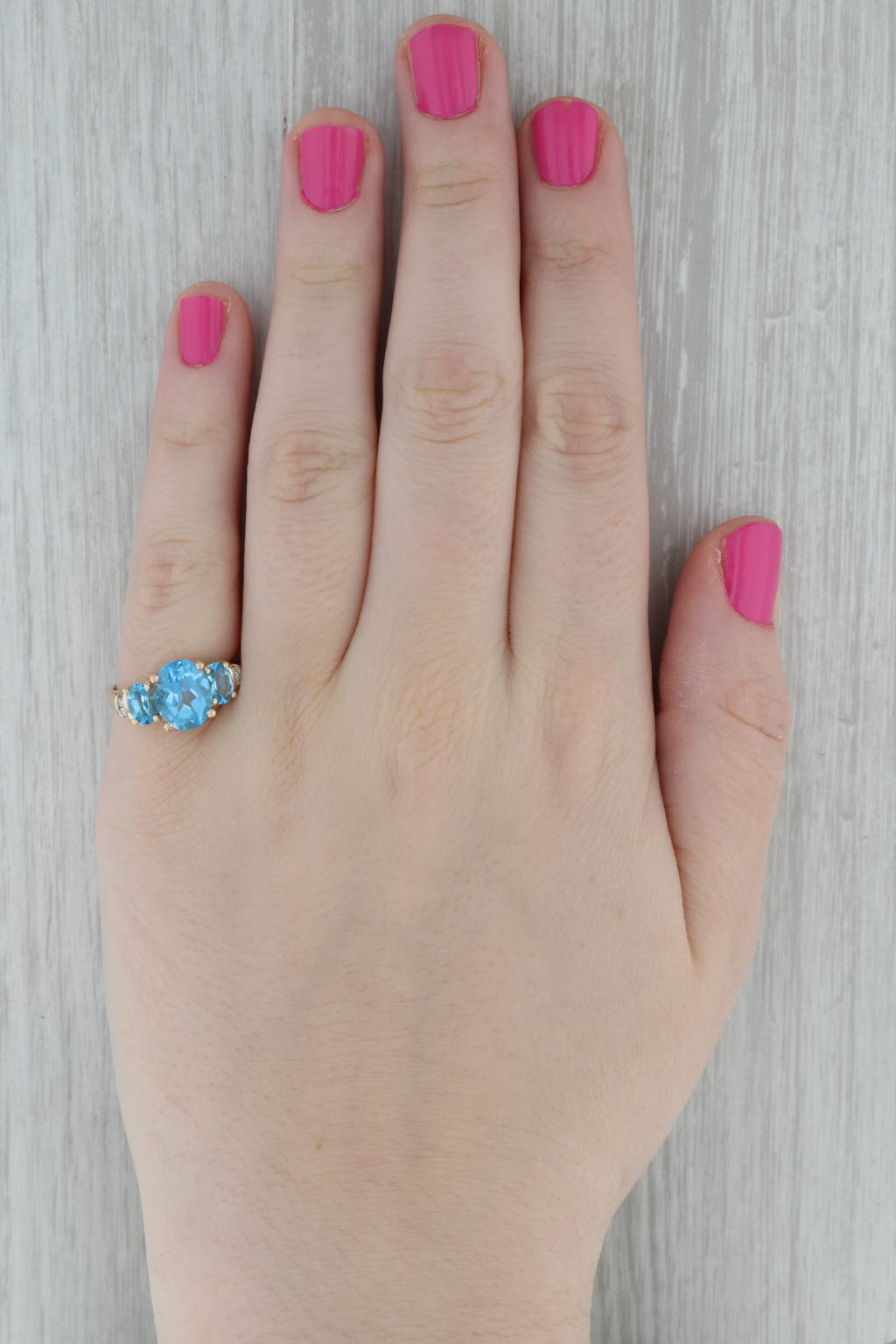 Dark Gray 4.48ctw Oval Blue Topaz Ring 14k Yellow Gold Diamond Accents Size 7