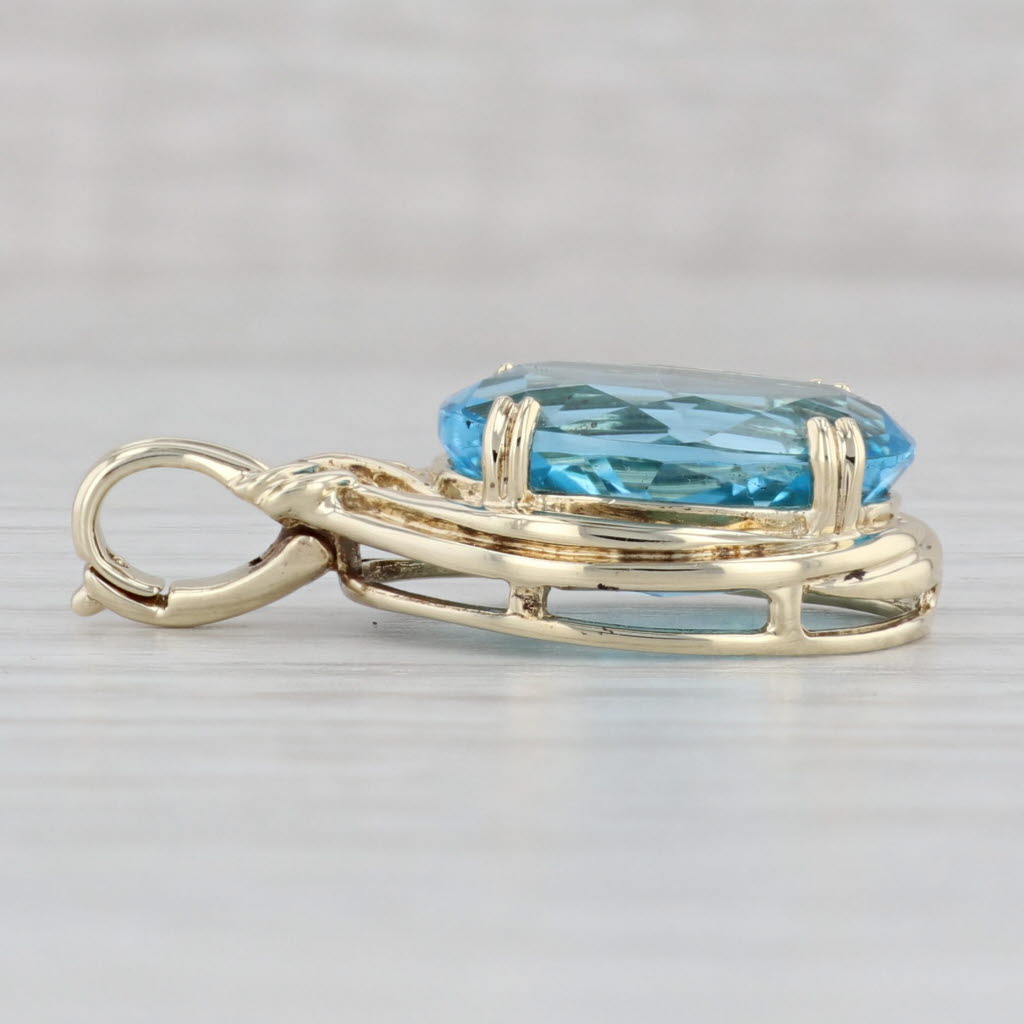 Gray 7.40ct Oval Blue Topaz Enhancer Pendant 10k Yellow Gold Clip Bail