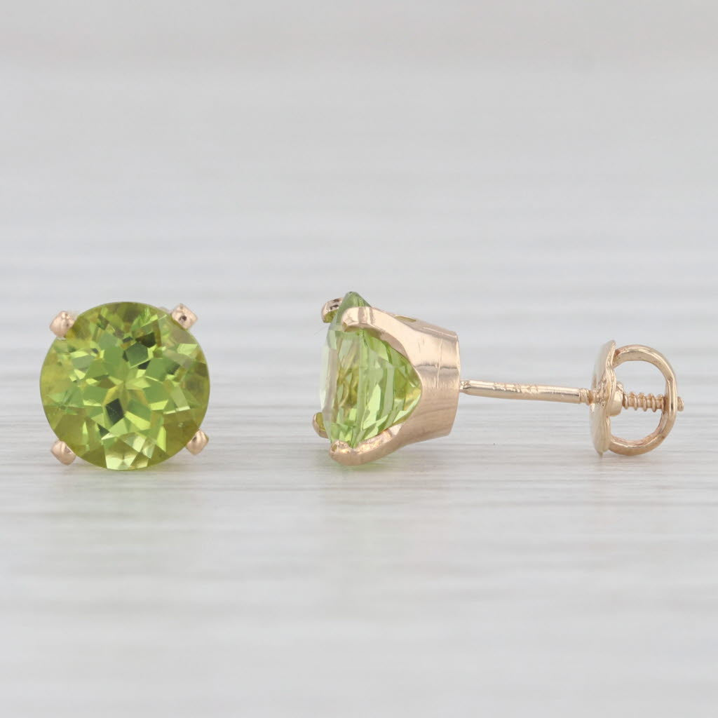 Light Gray 2.80ctw Green Peridot Stud Earrings 14k Yellow Gold Round Solitaires