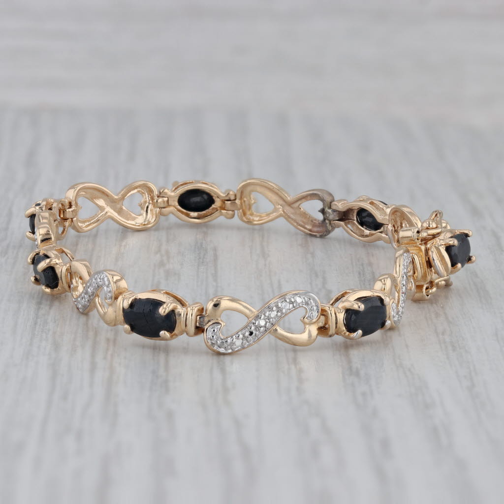 Gray 4.80ctw Blue Sapphire Bracelet Sterling Silver Gold Plated Diamond Accents 6.25"