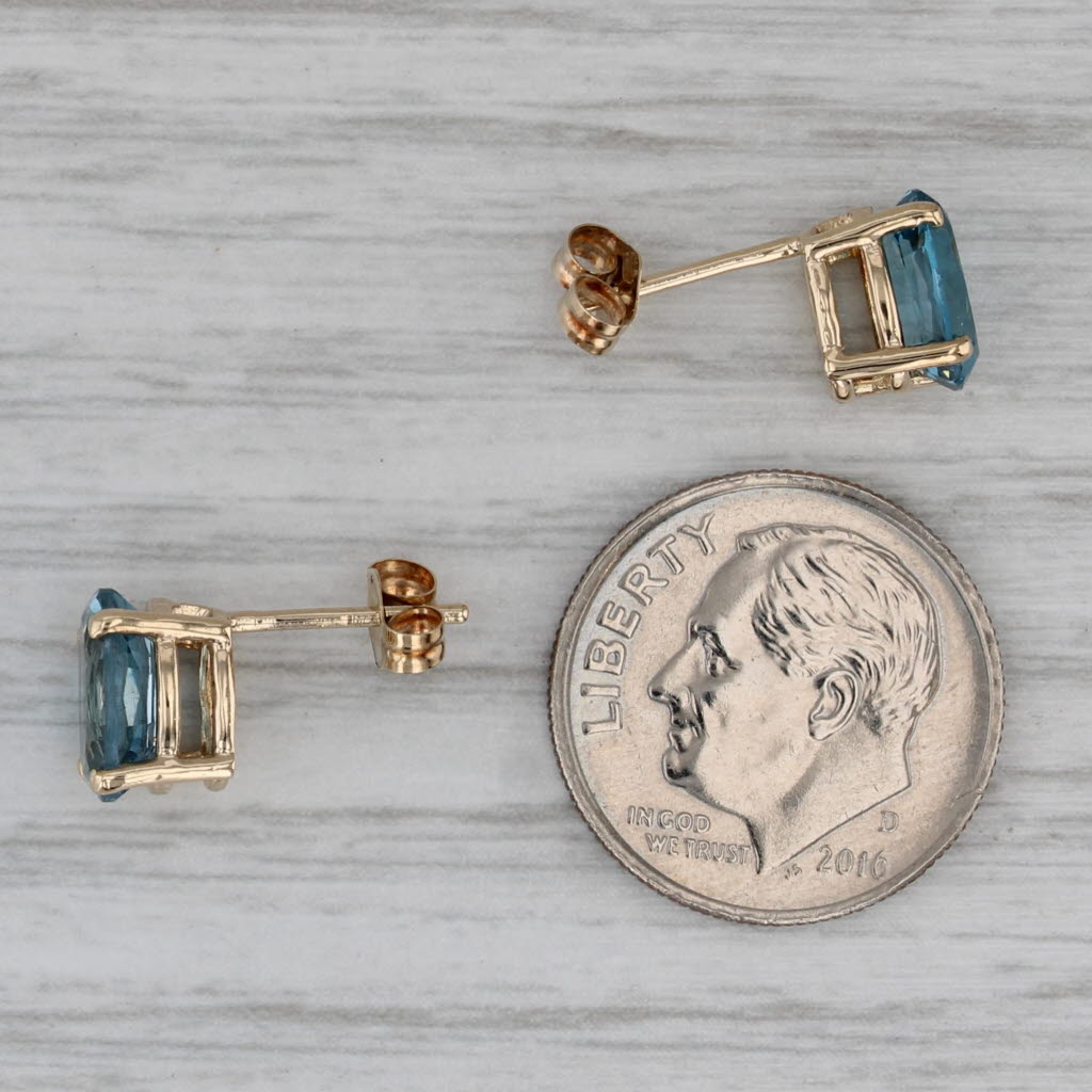 Gray 3.20ctw Oval Blue Topaz Solitaire Stud Earrings 14k Yellow Gold
