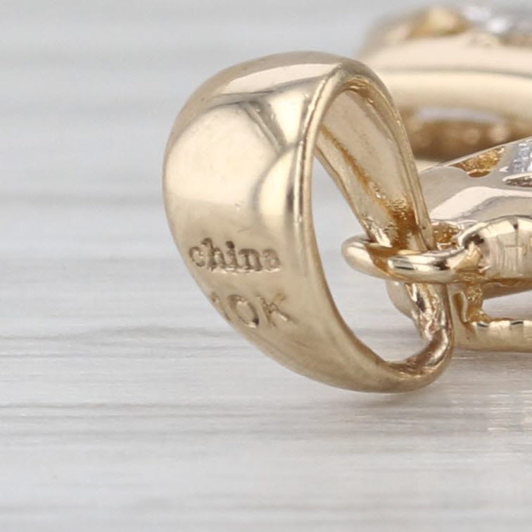 1.02ctw Tanzanite Diamond Cross Pendant 10k Yellow Gold Beveled